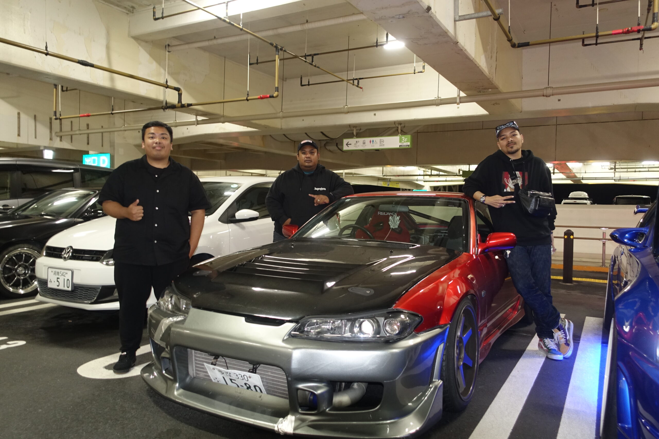 Nissan GT-Rs parked at night in Tokyo expressway