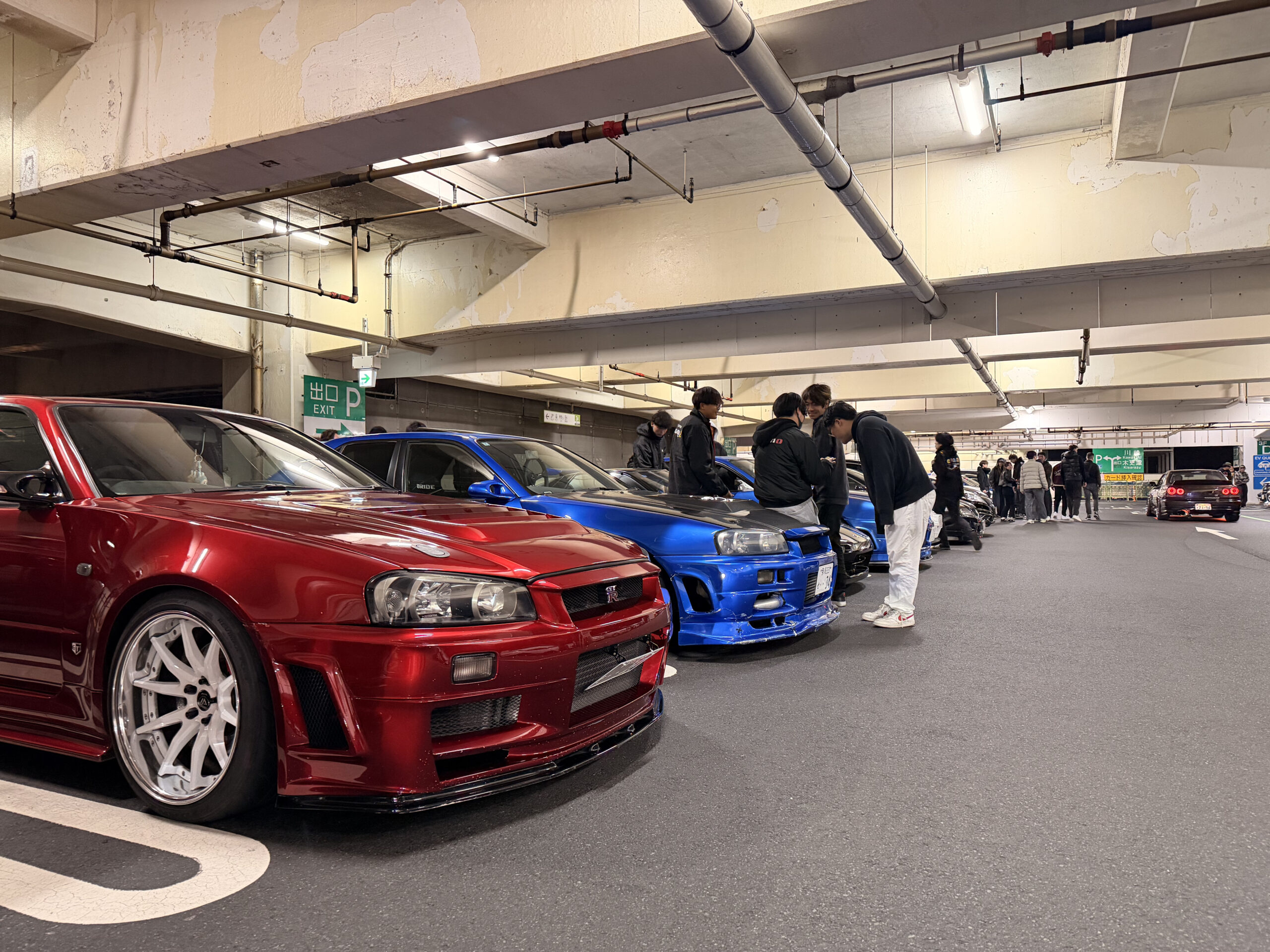 Close-up detail of Japanese performance cars at Umihotaru PA