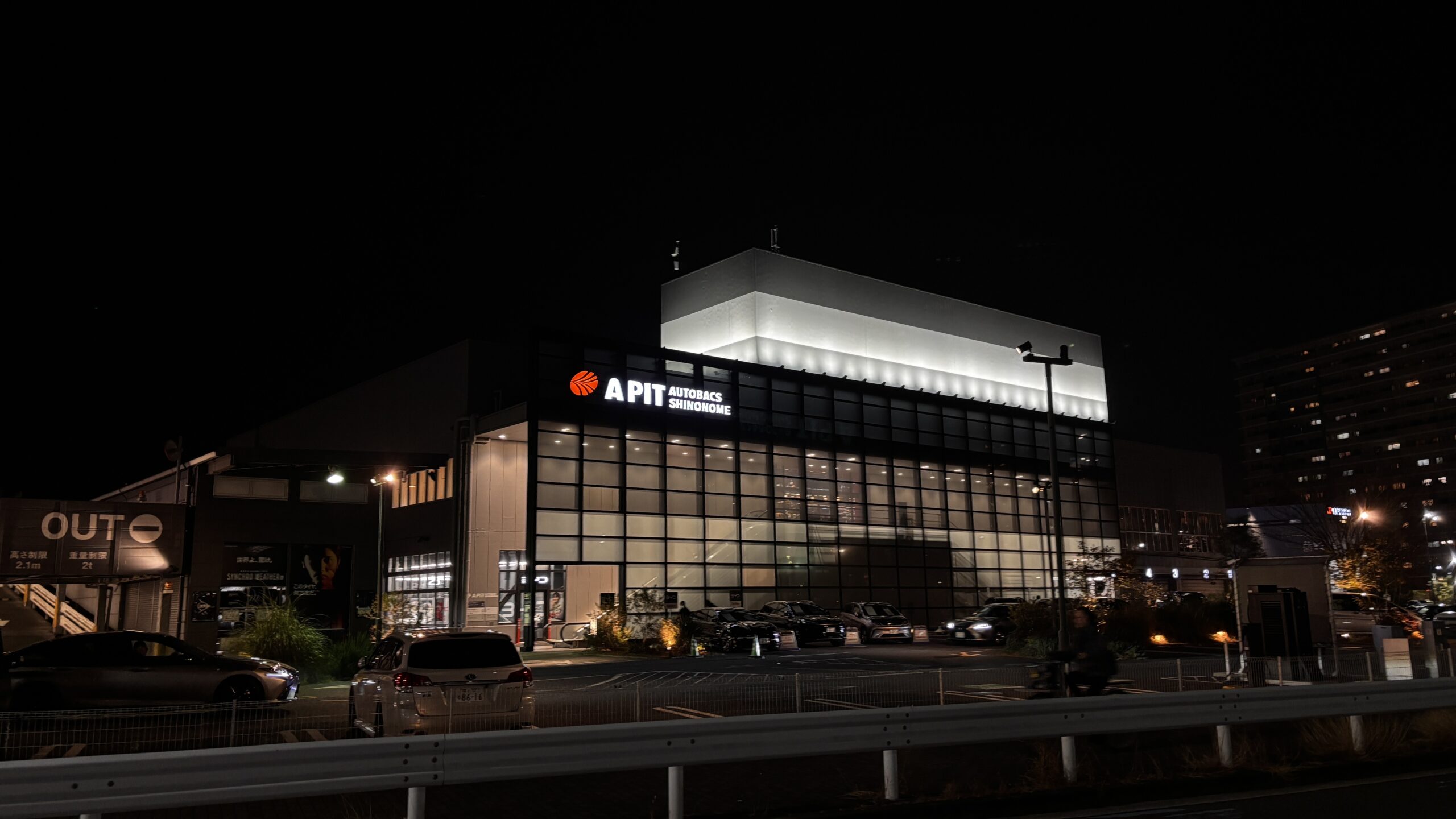 A PIT Shinonome Tokyo JDM shop exterior in Tokyo at night