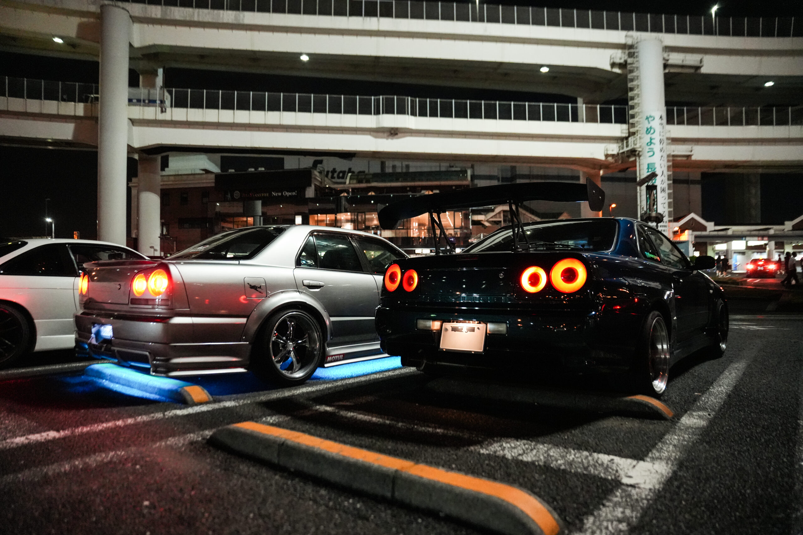 Nissan Skyline ER34 rear profile showing the classic circular tail lights