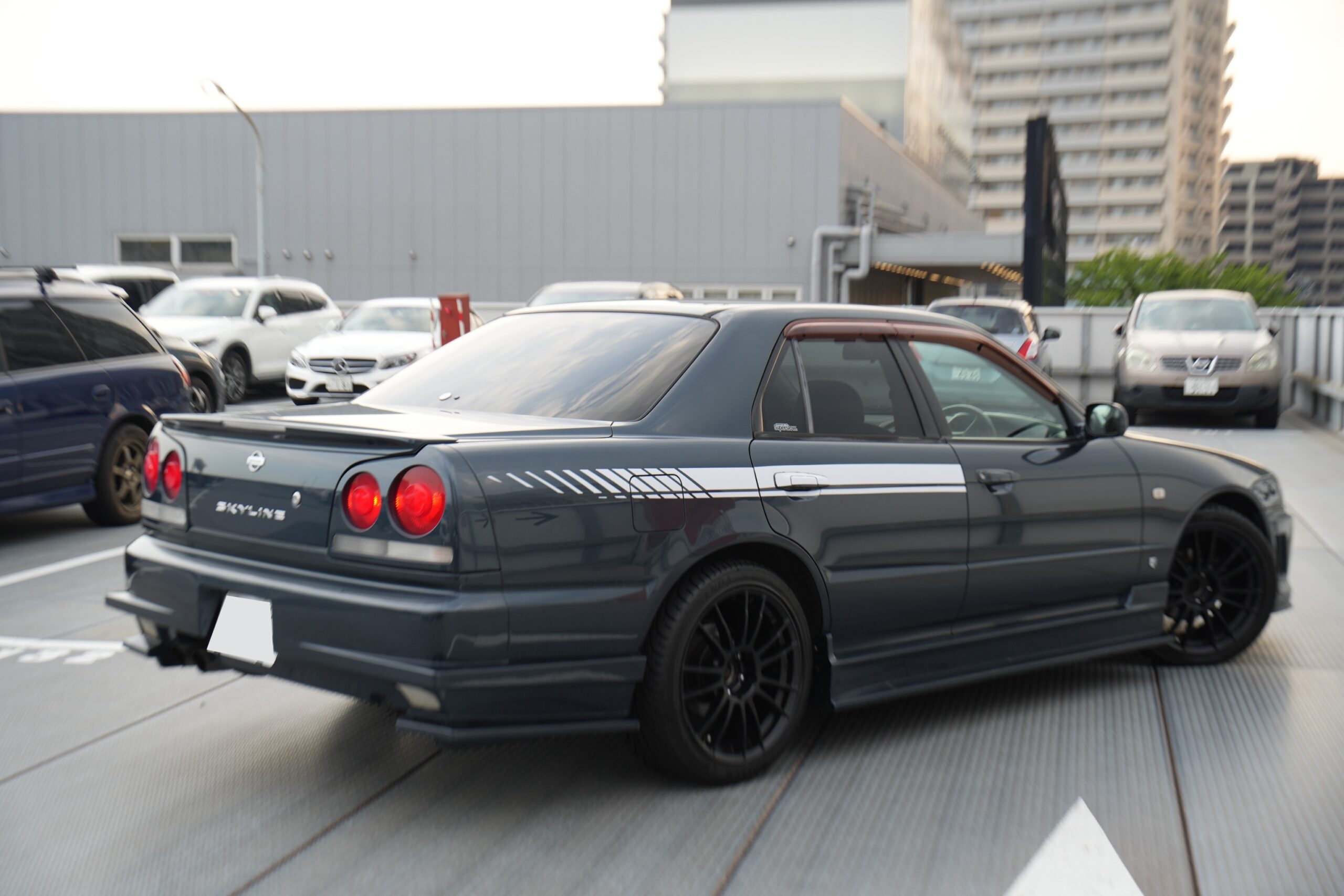 Nissan Skyline HR34 Sedan cruising Tokyo