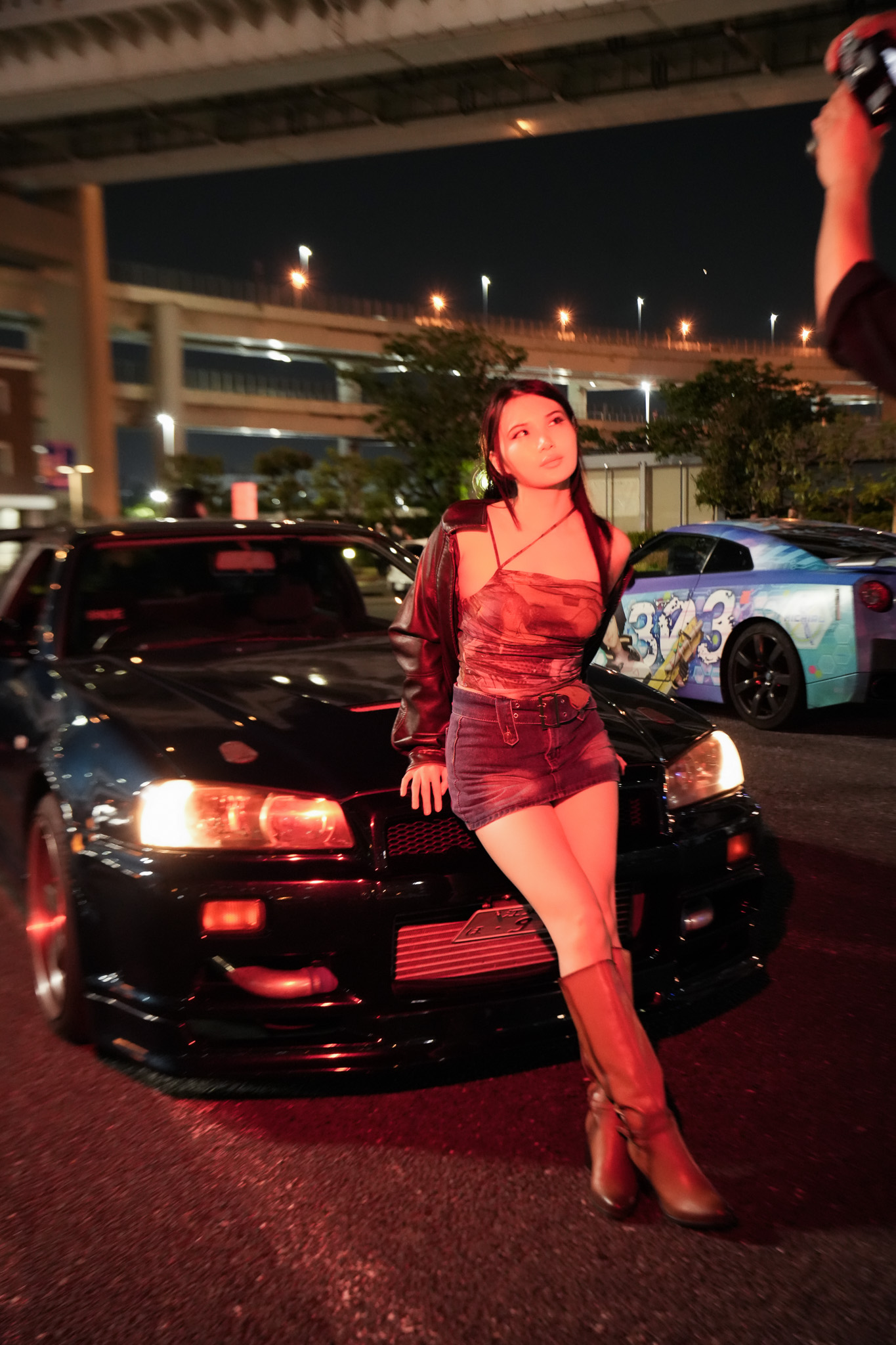 Happy guests experiencing Tokyo's night car culture with Wangun OG JDM fleet